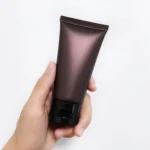 Туба косметическая коричневая матовая 50 г с чёрной откидной крышкой и мембраной 11 мм — scale.webp