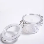Баночка для косметики PET прозрачная 120 мл с откидной крышкой и металлическим зажимом — open.webp